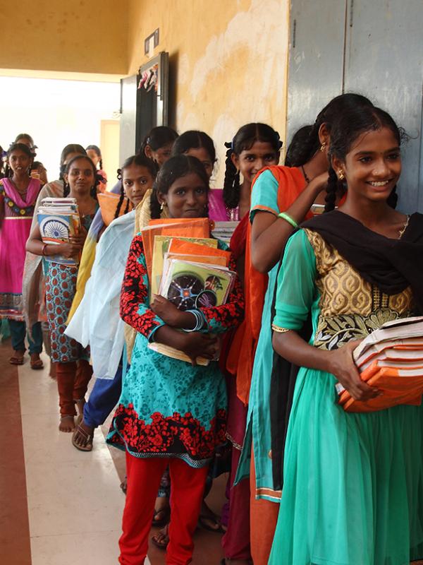 Girls waiting to go into class in India